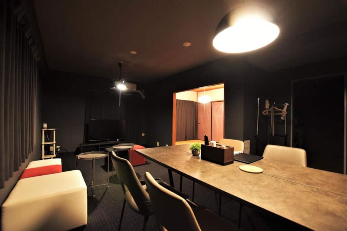 Deluxe Suite, 3 Bedrooms | Living area | Flat-screen TV