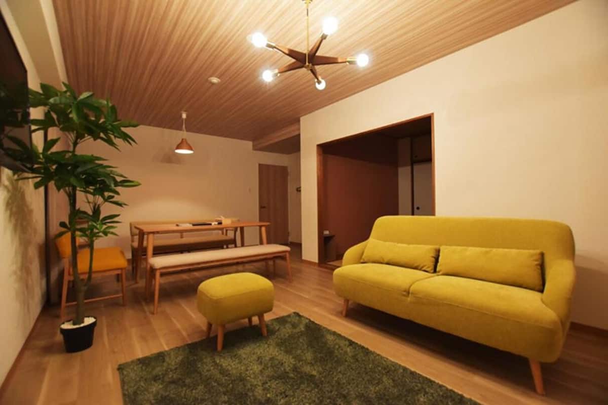Family Suite, 3 Bedrooms | Living area | Flat-screen TV