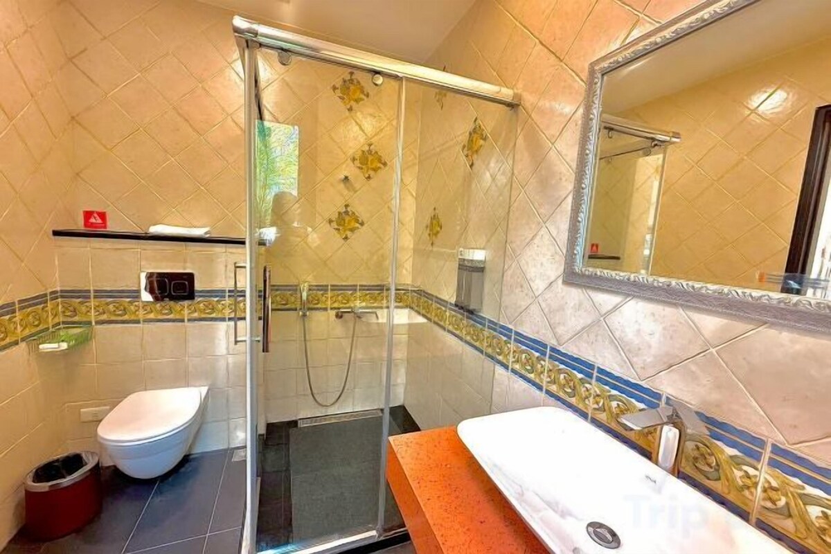 Bathroom | Hair dryer, slippers, towels, soap
