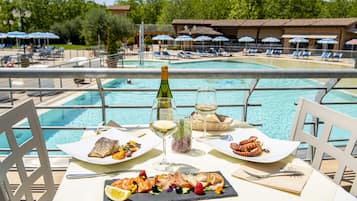 Breakfast, lunch, dinner served; Mediterranean cuisine, pool views