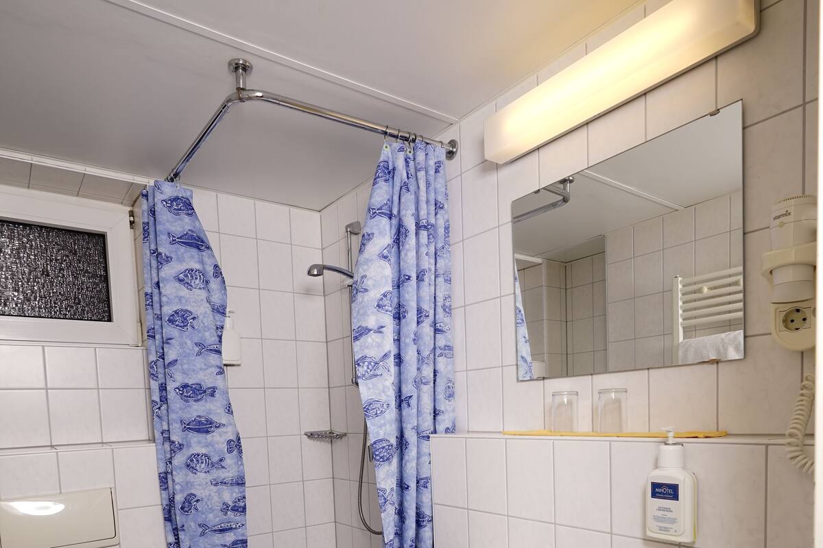 double room | bathroom | shower, hair dryer, towels