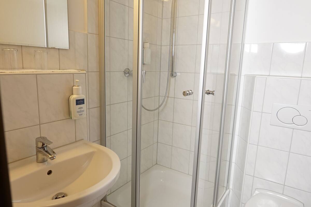 double room | bathroom | shower, hair dryer, towels