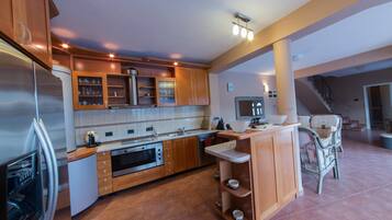 Villa, 3 Bedrooms, Pool Access, Pool View | Private kitchen | Fridge, stovetop, coffee/tea maker, electric kettle