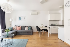Superior Apartment, 1 Bedroom, Balcony | Living area | 60-cm flat-screen TV with cable channels, TV