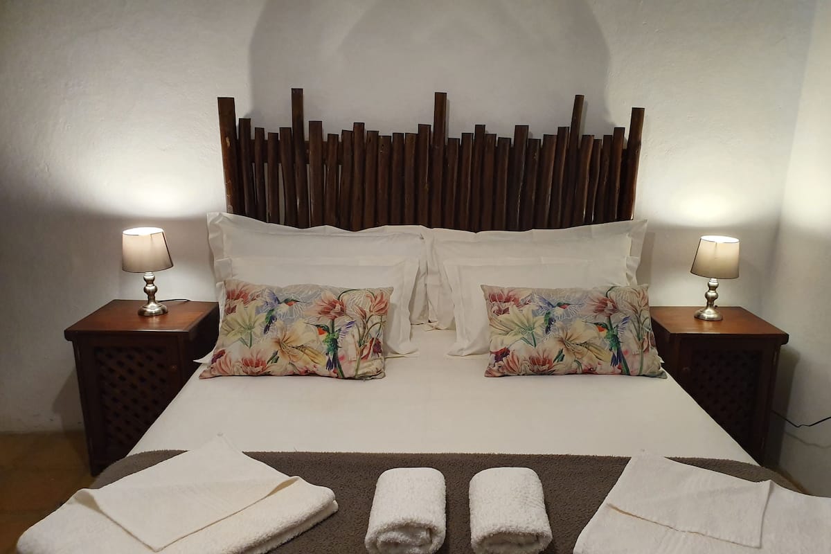 1 bedroom, desk, blackout drapes, iron/ironing board
