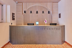 Welcome to CITY CENTRO, where a sleek reception area sets the tone for a stylish stay.