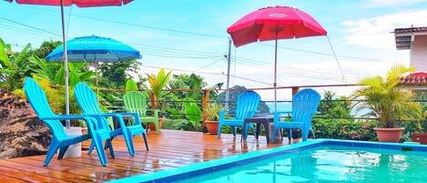 Outdoor pool, open 9:30 AM to 7:30 PM, pool loungers