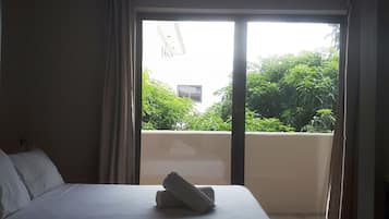 Economy Duplex, 2 Bedrooms | In-room safe, laptop workspace, blackout curtains, iron/ironing board