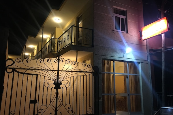 Front of property - evening/night