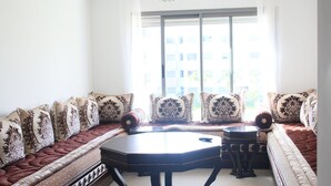 Standard Apartment, 2 Bedrooms | Living room | Flat-screen TV - Paradise Beach (El Mansouria)