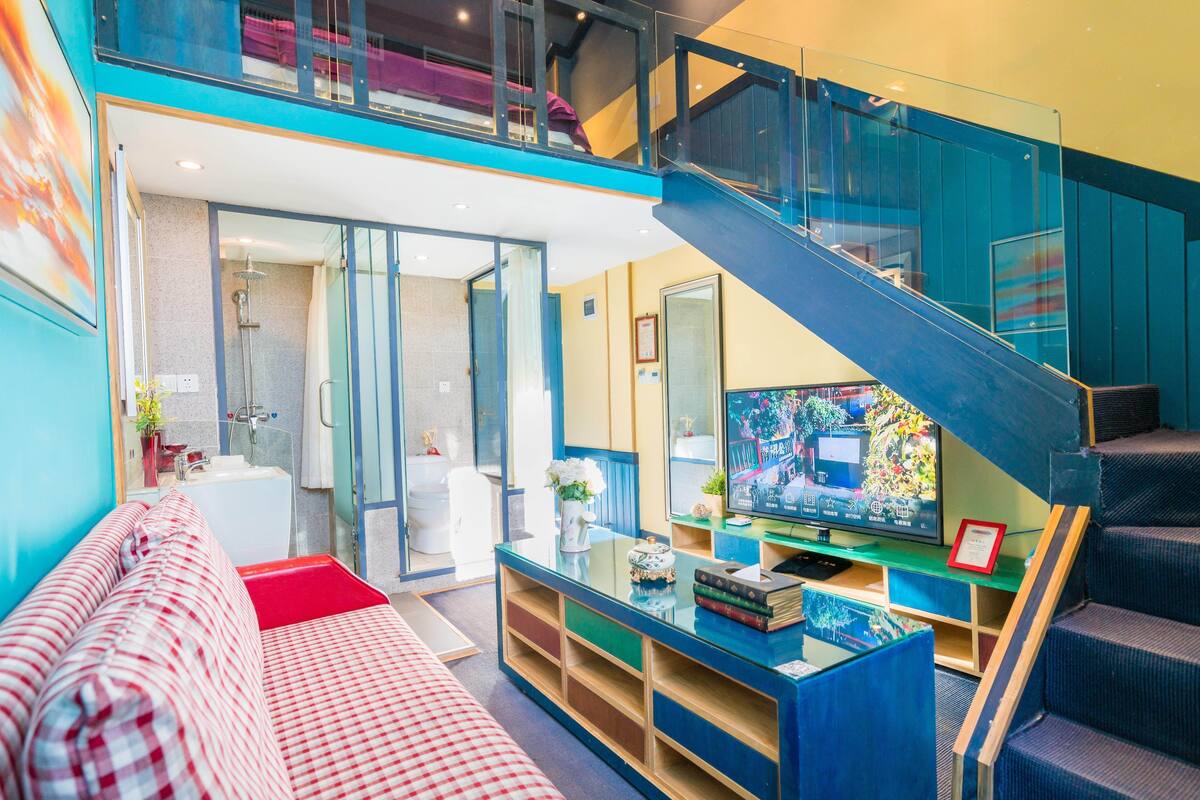 Boutique Duplex | Living area | LCD TV