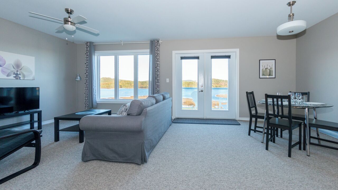 Suite Deluxe, 2 chambres, vue océan, vue mer | Coin séjour