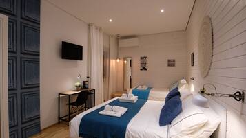 Cubrecamas, colchones con pillow-top y escritorio