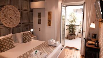 Down comforters, pillowtop beds, desk, laptop workspace