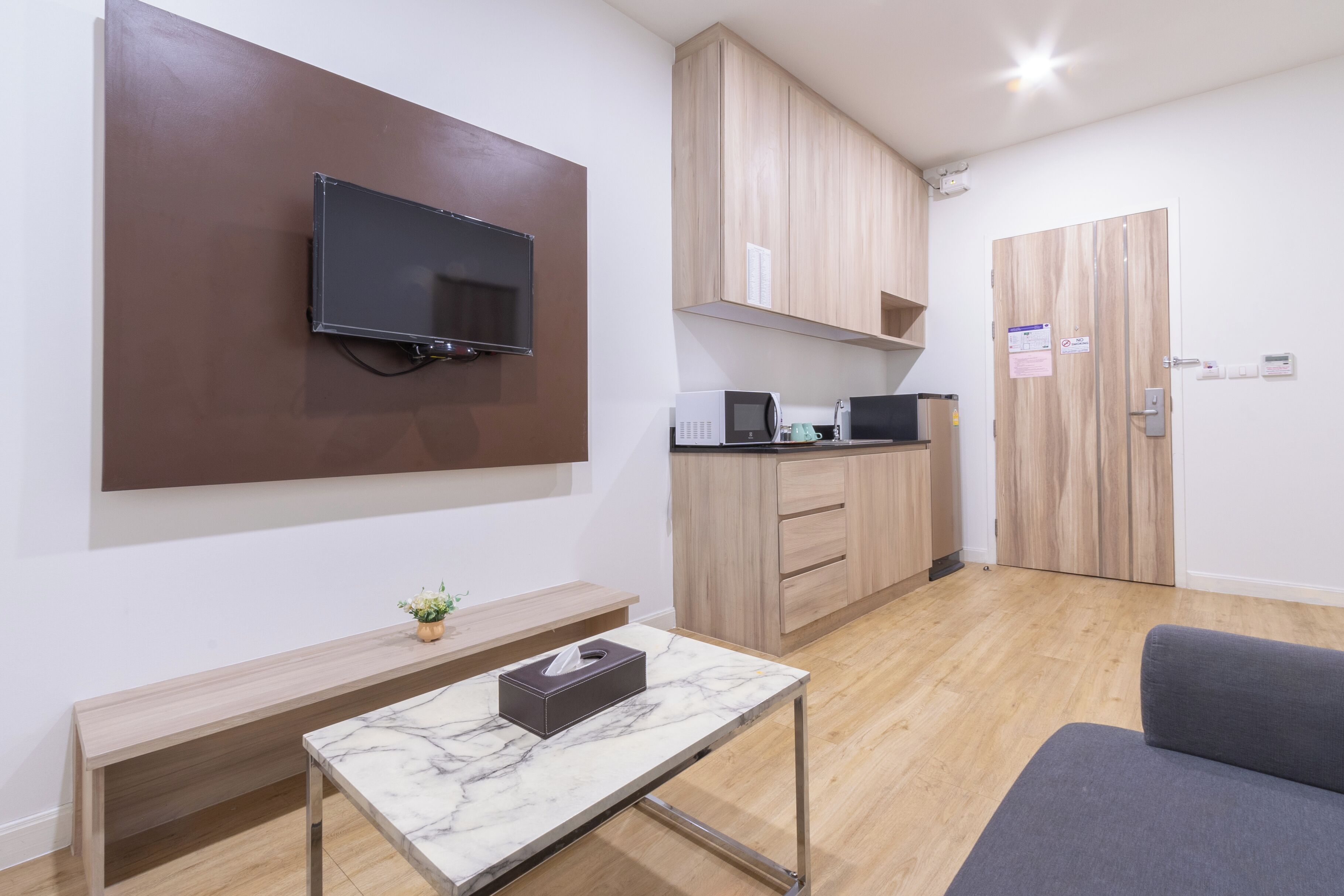 1 bedroom, no windows | living room | 32-inch smart tv with satellite channels, tv