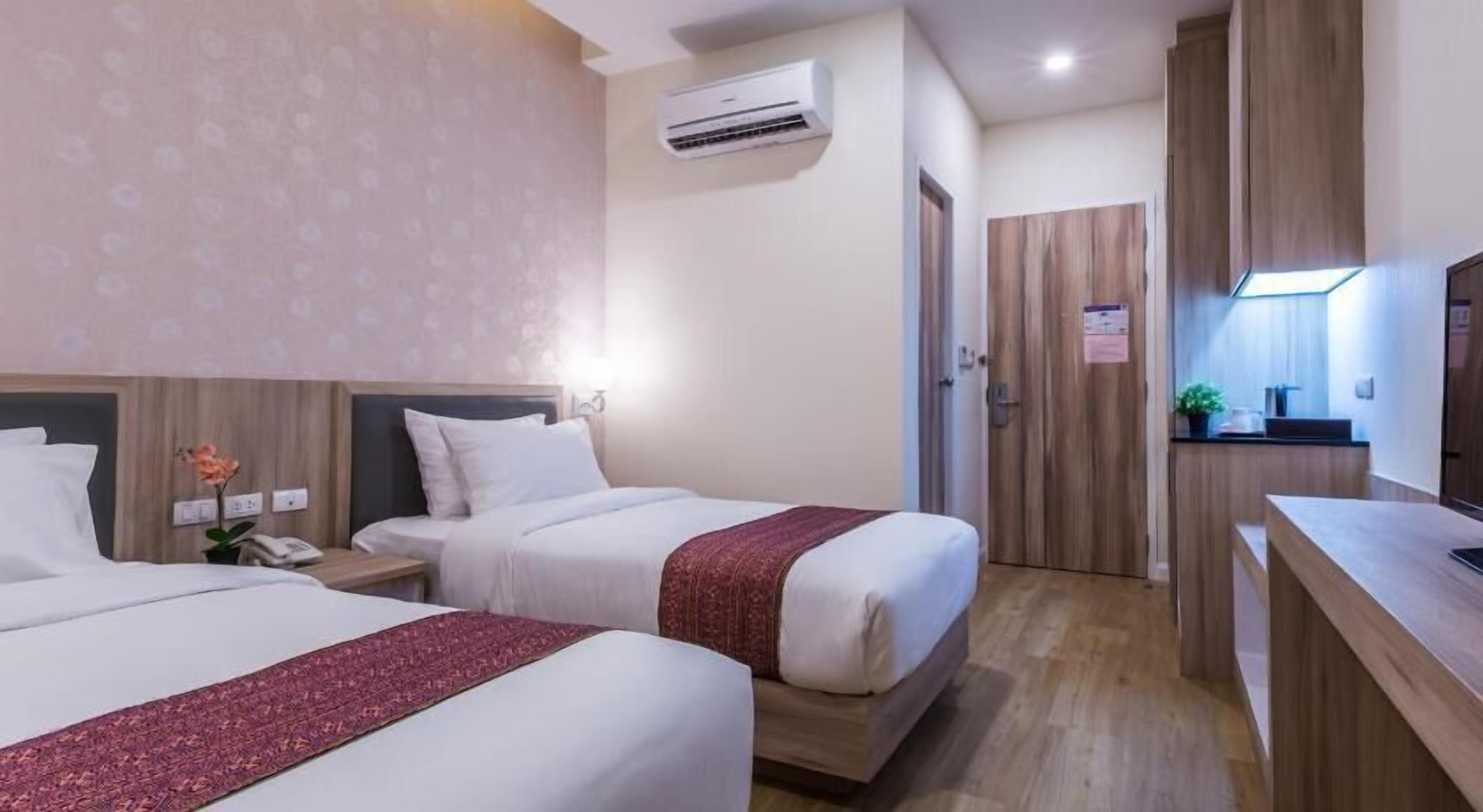 Coffres-forts dans les chambres, Wi-Fi gratuit, draps fournis