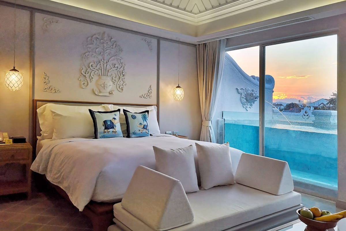 the glass pool suite | premium bedding, free minibar, in-room safe, blackout curtains
