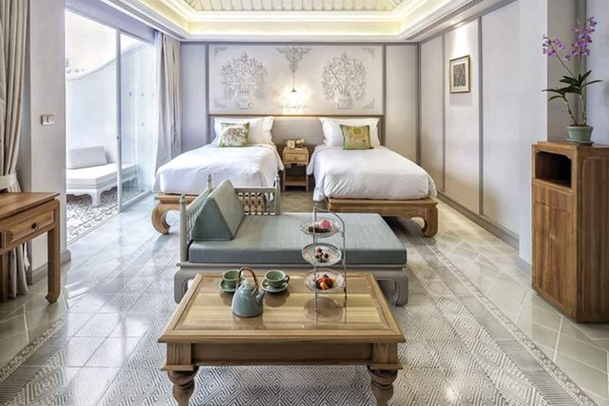 the bodhi pool suite - twin bed | premium bedding, free minibar, in-room safe, blackout curtains