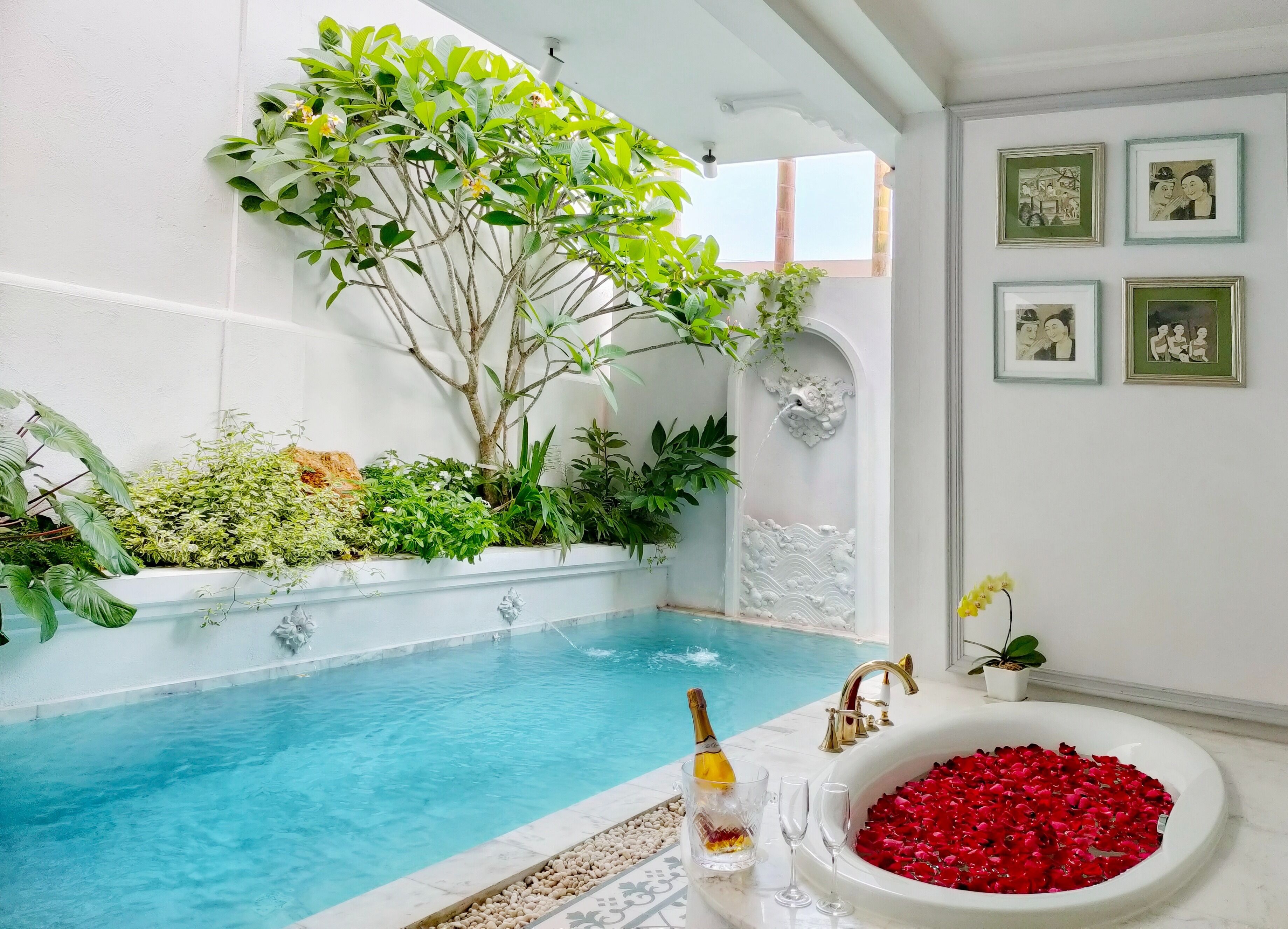 the corner pool suite | living area | 49-inch smart tv with cable channels, tv