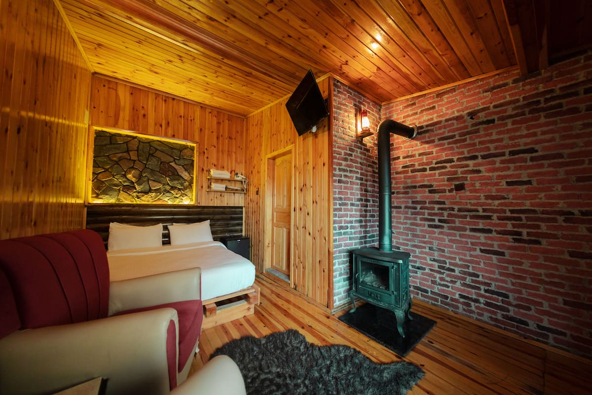 Design Tree House | Desk, laptop workspace, blackout drapes, free WiFi