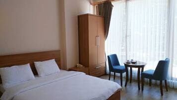 Elite Room | Egyptian cotton sheets, premium bedding, memory foam beds, in-room safe