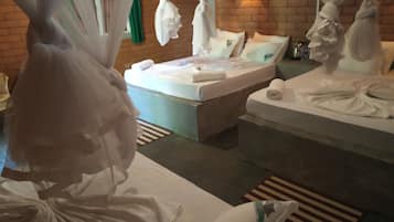 Deluxe Family Room | 1 bedroom, in-room safe, individually decorated, individually furnished