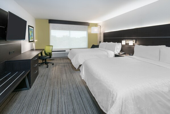 A hotel room with two beds, a desk, a chair, a TV, and a window with a view. - Holiday Inn Express & Suites Sugar Land SE - Missouri City by IHG (Missouri City)