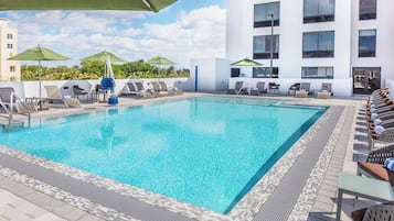 Outdoor pool, open 9:00 AM to 9:00 PM, sun loungers