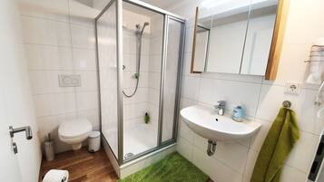 Separate tub and shower, deep soaking tub, free toiletries, slippers