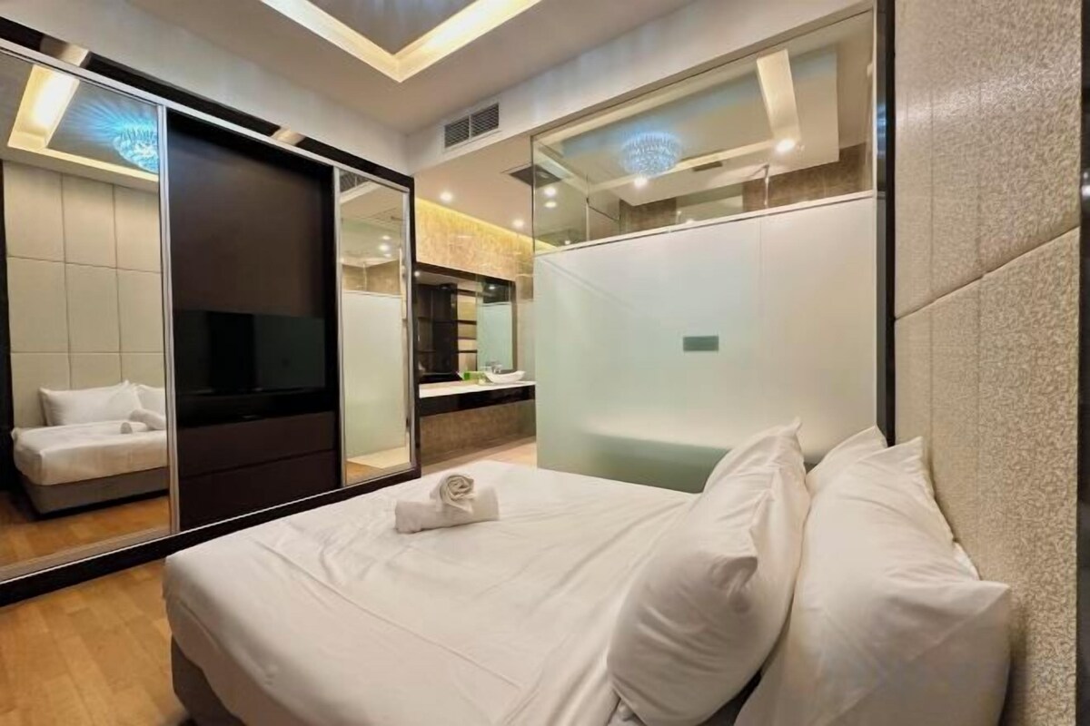 2 bedrooms, premium bedding, laptop workspace, soundproofing