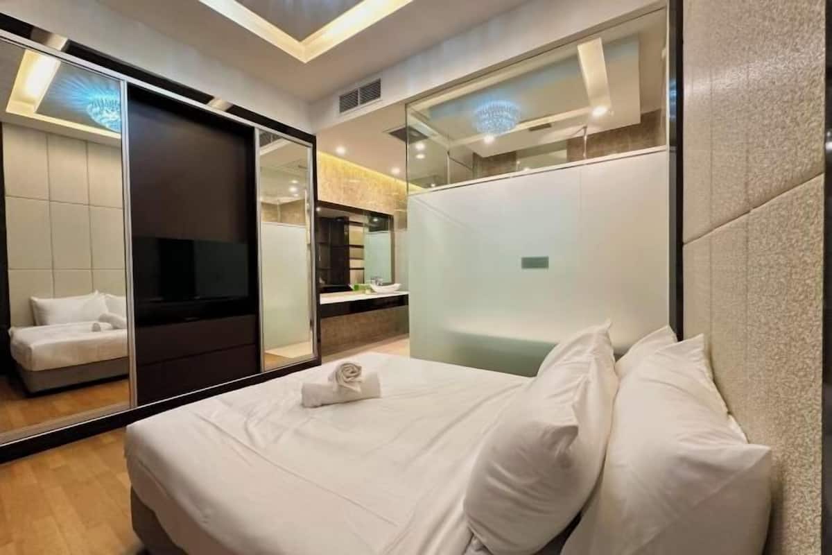 2 bedrooms, premium bedding, laptop workspace, soundproofing