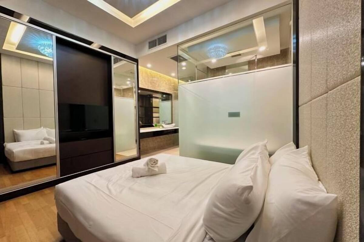 2 bedrooms, premium bedding, laptop workspace, soundproofing