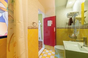 Comfort Room | Bathroom | Shower, free toiletries, hair dryer, slippers