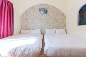 Family Room, 2 Double Beds | Individually furnished, free WiFi