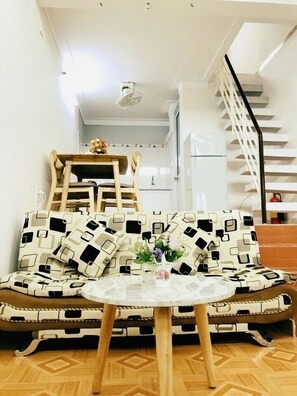 Basic Apartment, Kitchen | Living area | LCD TV - Timothy Homestay - Hue (Hue)