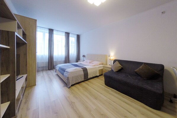 Business Studio Suite, Private Bathroom, City View | Desk, iron/ironing board, free WiFi - Stepan Razin 2 Apartments (Yekaterinburg)