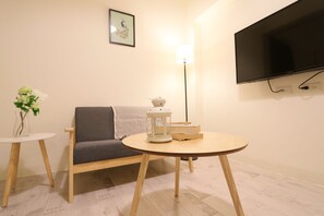 Deluxe Double or Twin Room | Living area | Flat-screen TV - Flora INN (Tainan)