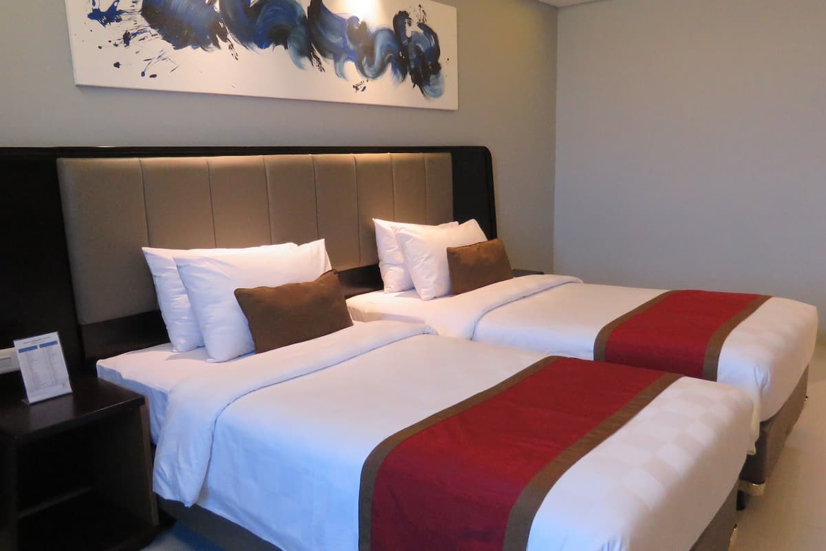 Ropa de cama de alta calidad y minibar