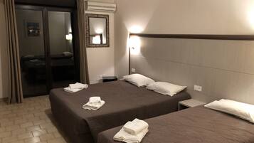 Premium bedding, desk, blackout curtains, rollaway beds