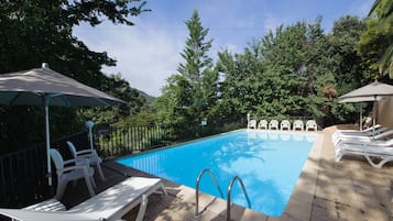 2 outdoor pools, pool umbrellas, pool loungers
