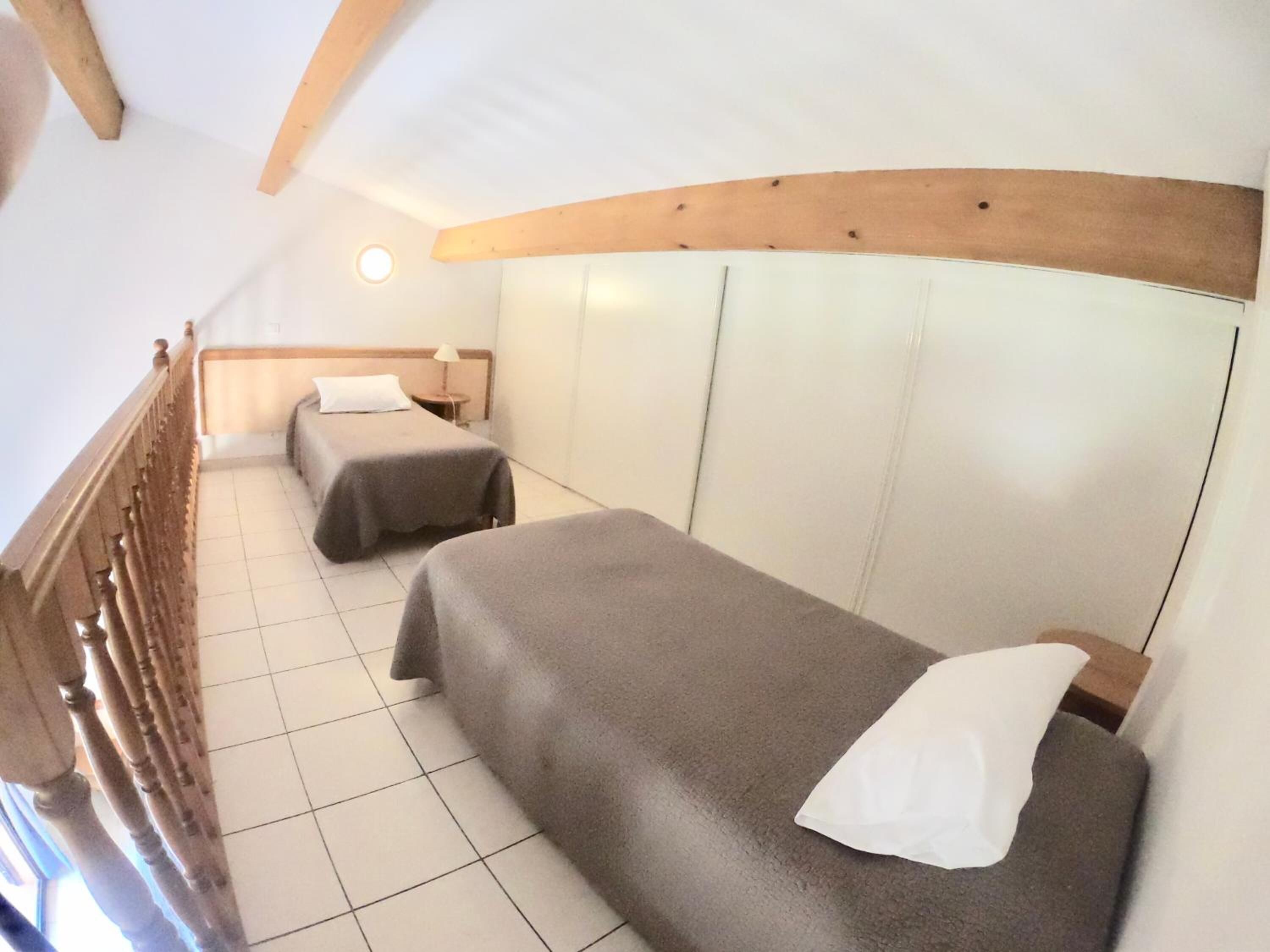 premium bedding, desk, blackout curtains, rollaway beds