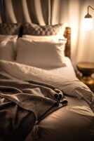 1 bedroom, premium bedding, down comforters, pillowtop beds