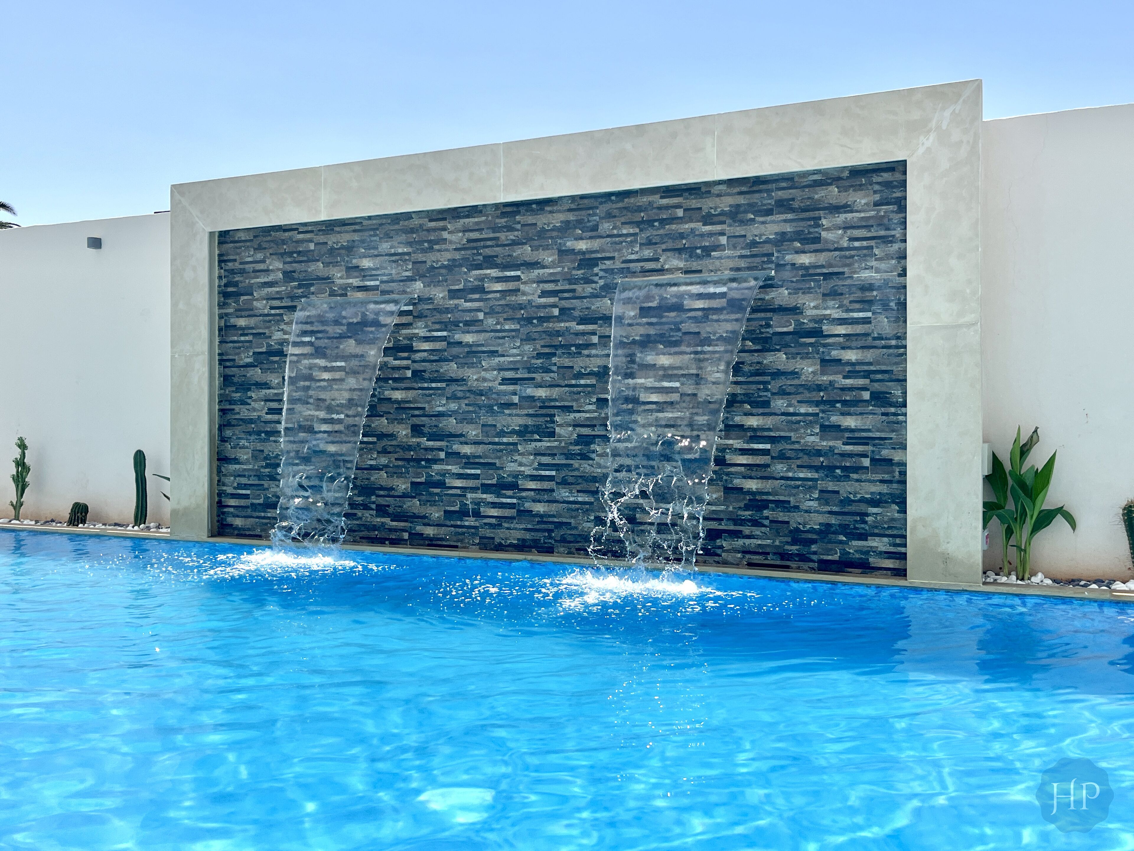 outdoor pool, open 10:30 am to 8:00 pm, pool umbrellas