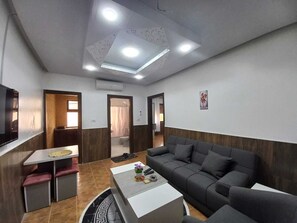 36-inch flat-screen TV with satellite channels, TV