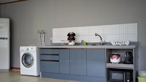 Coffee/tea maker, full-size fridge, microwave (on request), stovetop