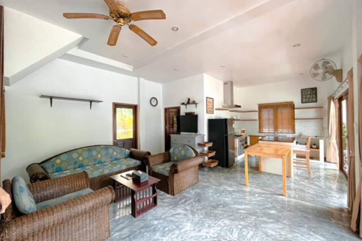 villa, 2 bedrooms, poolside | living area | 45-inch led tv with cable channels, tv, dvd player