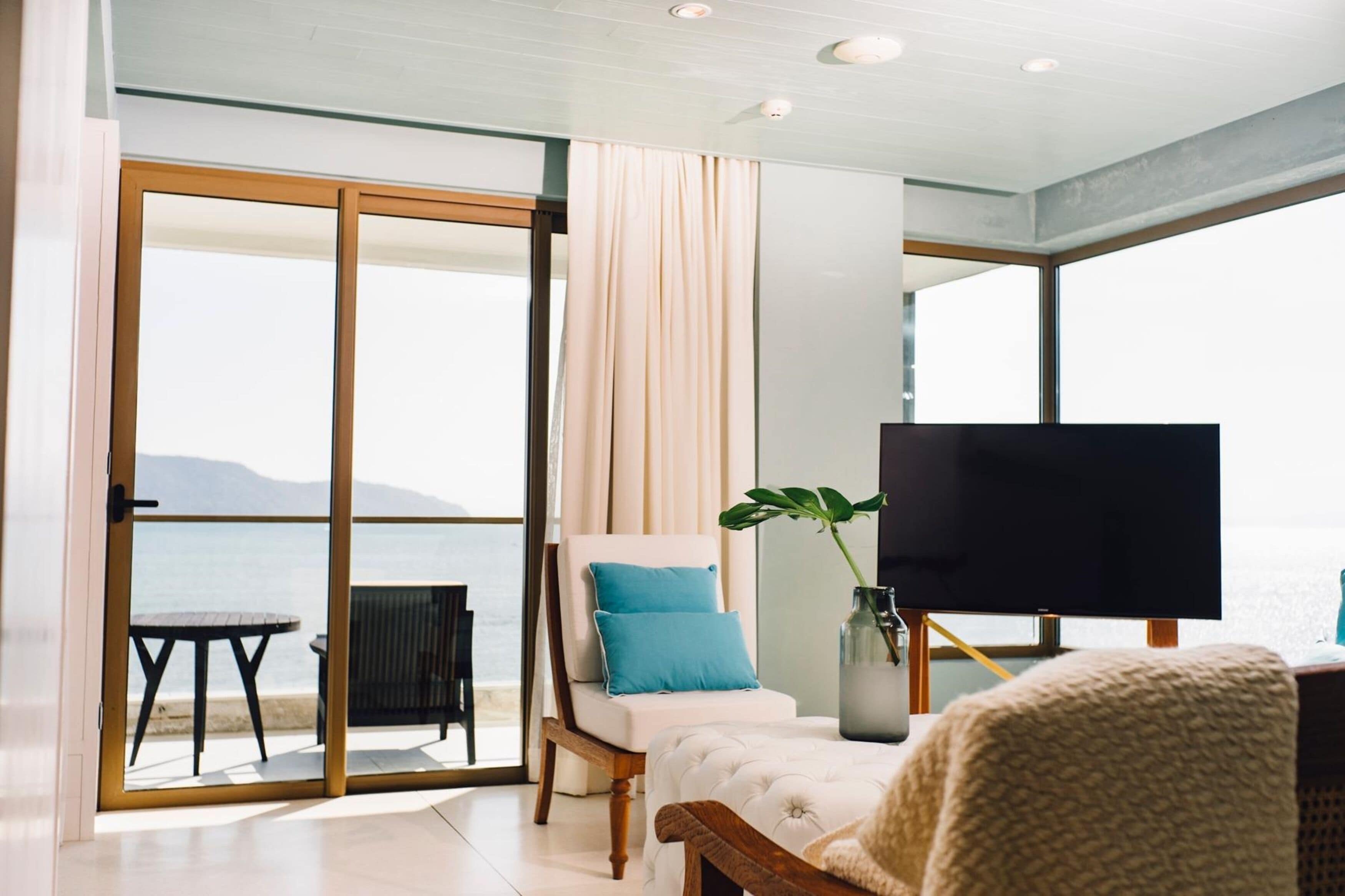 grand suite | living area | 45-inch led tv with cable channels, tv, dvd player