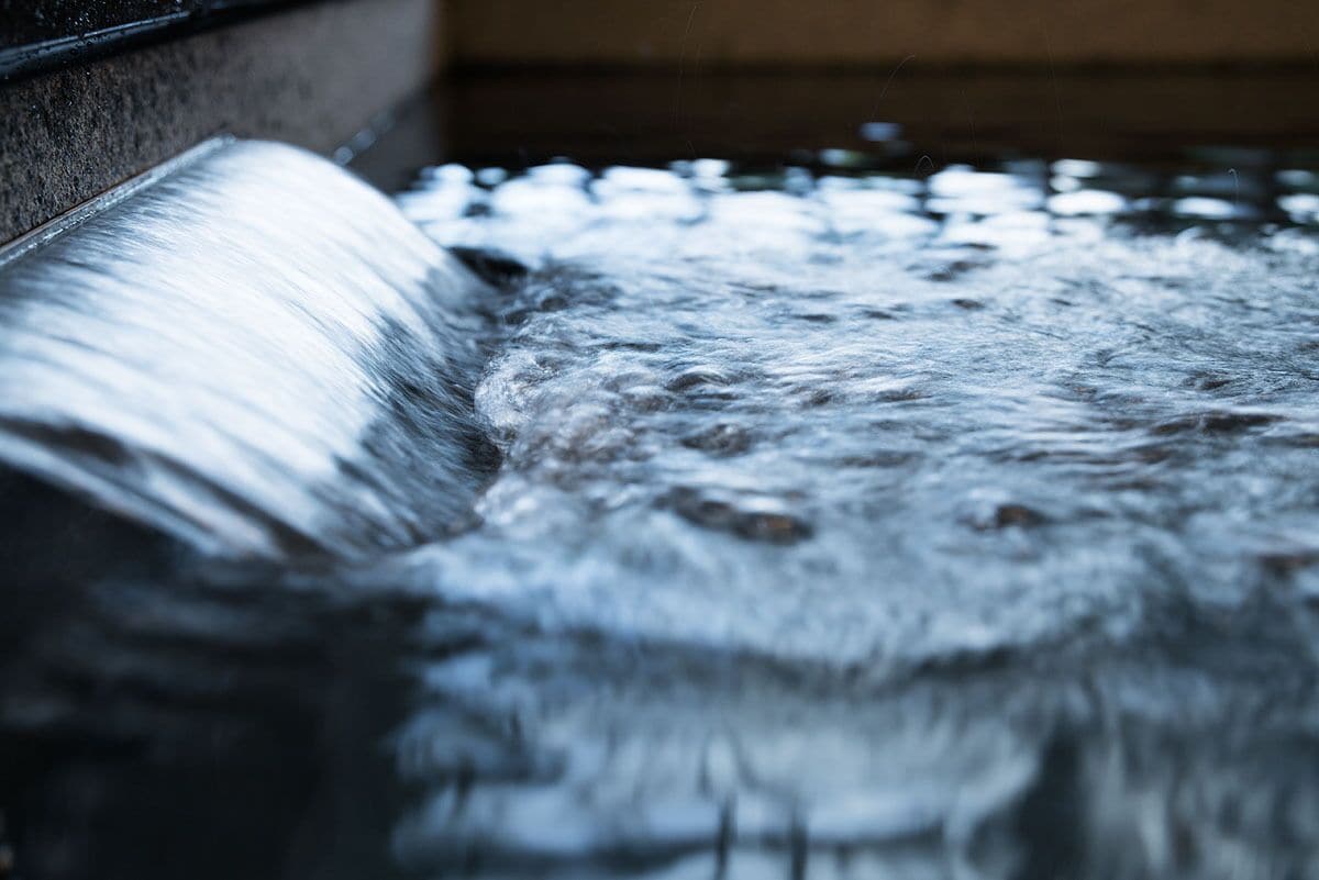 A close-up of a water feature with flowing water.