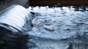 A close-up of a water feature with flowing water.