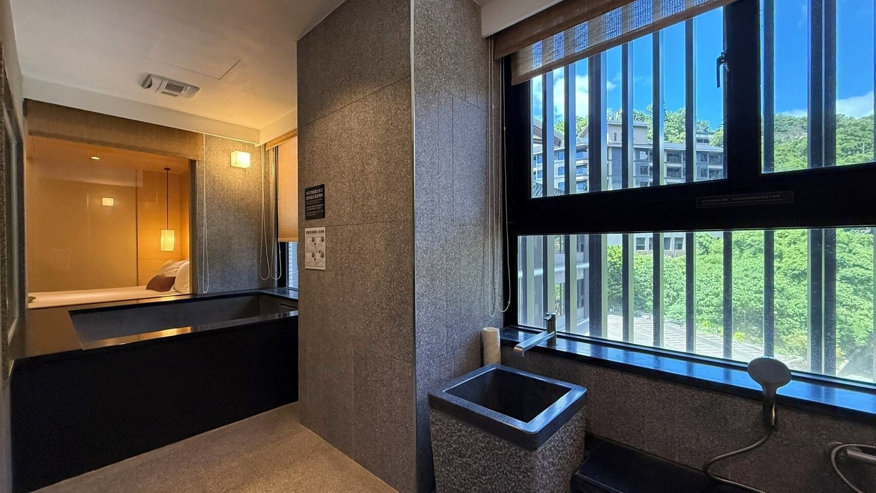 deluxe double room | bathroom | spring water bathtub, rainfall showerhead, hair dryer, bathrobes